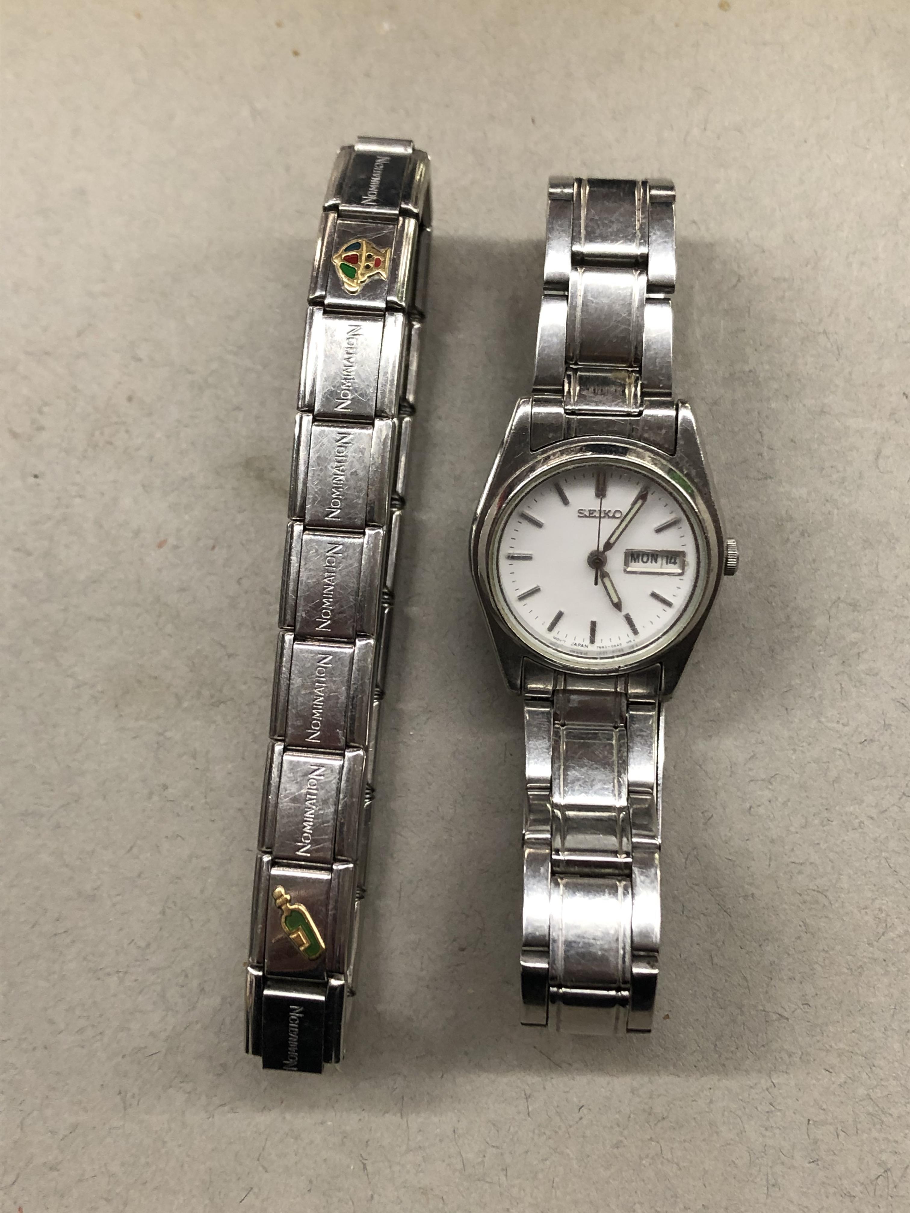 LADIES SEIKO DAY DATE STAINLESS STEEL WRIST WATCH AND A NOMINATION EXPANDING BRACELET