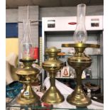 THREE BRASS OIL LAMPS