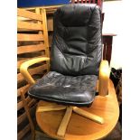 BEECH AND BLACK LEATHER SWIVEL ARMCHAIR AND MATCHING STOOL