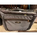 SAMSONITE SUIT BAG AND LEATHER BRIEF CASE