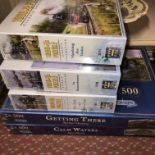 TWO 500 PIECE JIGSAW PUZZLES AND THREE 1000 PIECE JIGSAW PUZZLES