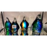 FAMILY OF FOUR GLASS COLOURED LIMITED EDITION PENGUINS