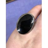 WHITE METAL AND OVOID ONYX SIGNET RING