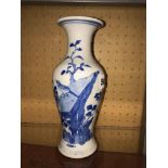 CHINESE BLUE AND WHITE BALUSTER VASE DECORATED WITH BIRDS AMIDST FOLIAGE