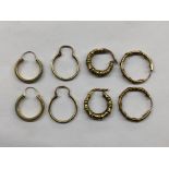 FOUR PAIRS OF GOLD CREOLE AND HOOP EARRINGS 5.