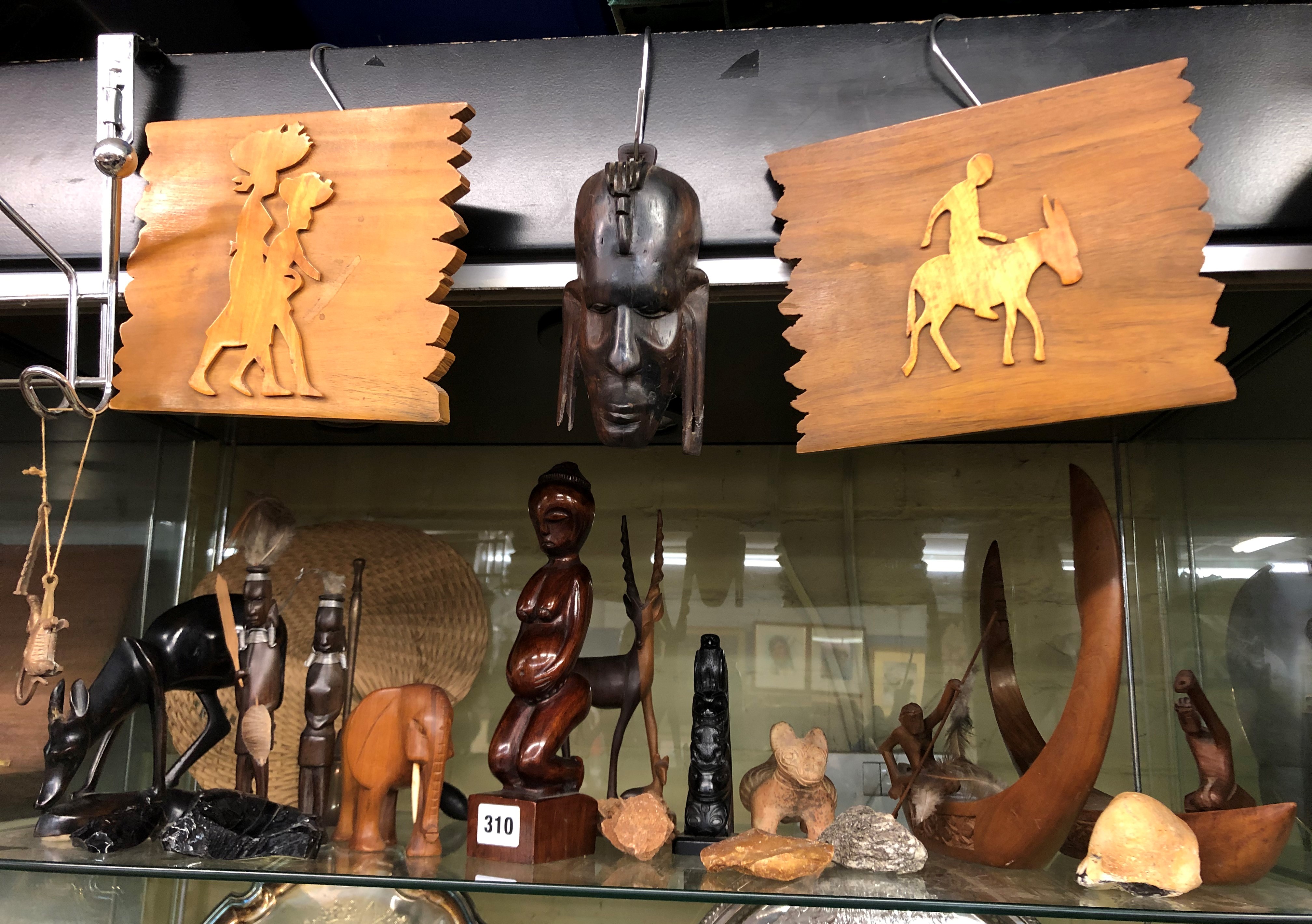 SHELF OF WOODEN CARVED AFRICAN TRIBAL FERTILITY AND ANIMAL FIGURES AND ROCK SAMPLES