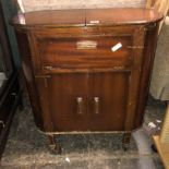 1950S MOBILE DRINKS CABINET WITH SLIDING TOP AND FITTED INTERIOR