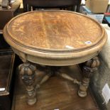 OAK CIRCULAR CARVED CUP AND COVER CROSS STRETCHER TABLE