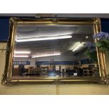 GILT SWEPT FRAMED MIRROR