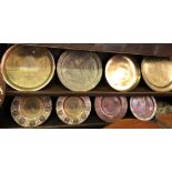 SELECTION OF EASTERN ENGRAVED BRASS SHALLOW DISHES AND WALL CHARGERS