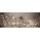 SHELF OF CUT GLASS MALLET AND SHIP'S DECANTERS,