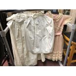 TWO EARLY 20TH CENTURY COTTON CHRISTENING TYPE GOWNS AND A DRESS