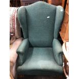 GREEN UPHOLSTERED QUEEN ANNE STYLE WING BACK ARMCHAIR