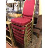 STACK OF SEVEN RED FABRIC BANQUETING CHAIRS