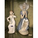 NAO FIGURE OF A SEATED GIRL IN A BONNET AND AN ANGEL