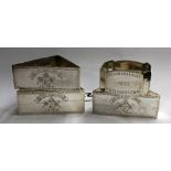 THREE SILVER TRIANGULAR NAPKIN RINGS WITH MASONIC ENGRAVED EMBLEM AND A SQUARE CANTED EDGED NAPKIN