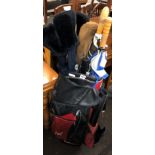 HOLDALL OF GOLF CLUBS AND UMBRELLAS