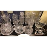 SHELF OF CUT GLASS DECANTERS, TAPERED VASES,