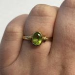 9CT GOLD PERIDOT RING SIZE K/L 2.