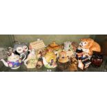 SHELF OF NOVELTY CERAMIC TEAPOTS AND COOKIE JARS