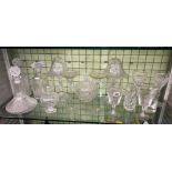 SHELF OF VARIOUS DECANTERS, ETCHED GLASSWARE,