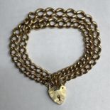 9CT GOLD HEAVY LINK BRACELET WITH HEART PADLOCK AND SAFETY CHAIN 53.