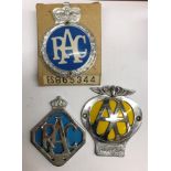 TWO BOXED RAC GRILLE BADGES AND AN AA GRILLE BADGE