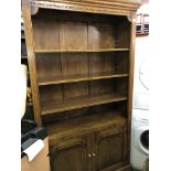 OAK CARVED BOOKCASE CUPBOARD WITH PULL OUT SLIDE