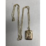 9CT GOLD BACK AND FRONT ENGRAVED SQUARE LOCKET ON A 9CT GOLD FLAT LINK CURB CHAIN 7.