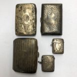THREE SILVER CIGARETTE CASES AND TWO SILVER ENGRAVED VESTA CASES A/F 6.