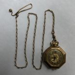 ROSE COLOURED METAL OCTAGONAL CASED WATCH ON AN UNMARKED ROSE METAL LINK CHAIN 17.