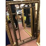 SEGMENTED ORNATE FRAMED MIRROR