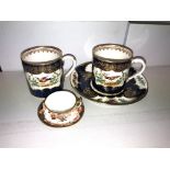 18TH CENTURY WORCESTER COFFEE CAN AND SAUCER AND ONE COFFEE CAN AND A MINIATURE ROYAL CROWN DERBY