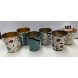 SERIES OF SIX METAL AND ENAMEL DECORATIVE BEAKERS