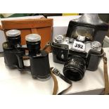 ZENIT E 35MM CAMERA AND A PAIR OF PRINZ 8 X 30 BINOCULARS IN CASE