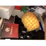 CARTON CONTAINING A PINEAPPLE ICE BUCKET, RED GLASSWARE, BOTTLE OF CARLOS IST BRANDY, BAR SHAKER,