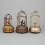 Group of Three Swiss or German Automaton Singing Birds in Cages, early-mid 20th century, tallest hei