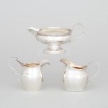 Three Victorian and Later English Silver Cream Jugs, Birmingham, 1894/1925/1932, largest height 3.1