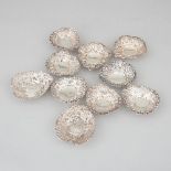 Ten Late Victorian Silver Pierced Heart-Shaped Bonbon Dishes, London and Birmingham, 1894-97, larges