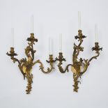 Large Pair of French Louis XV Rococo Style Gilt Bronze Three Light Wall Sconces, late 19th century,