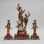 French Gilt Metal and Rouge Griotte Marble Three Piece Clock Garniture, c.1900, height 26.25 in — 66