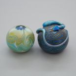 Two American Iridescent Glass Paperweights, Orient & Flume and Lundberg Studios, 1976/77, largest di