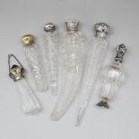 Six Silver and Metal Mounted Cut Glass Perfume Bottles and Phials, late 19th/early 20th century, lar