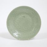 A Celadon Moulded Dish, Late Qing Dynasty, 晚清 青釉刻花纹盘, diameter 11.4 in — 29 cm