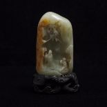 A Pale Celadon and Russet Jade 'Scholar and Boy' Boulder, 青白玉雕'高仕童子'山子, height 4.7 in — 12 cm