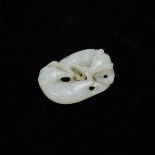 A White Jade Carving of Two Badgers, Qing Dynasty, 清 白玉双獾把件, length 1.7 in — 4.4 cm