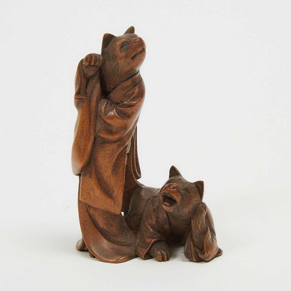 A Wood Netsuke of a Pair of Cats Dressed in Kimono, height 2.4 in — 6.2 cm