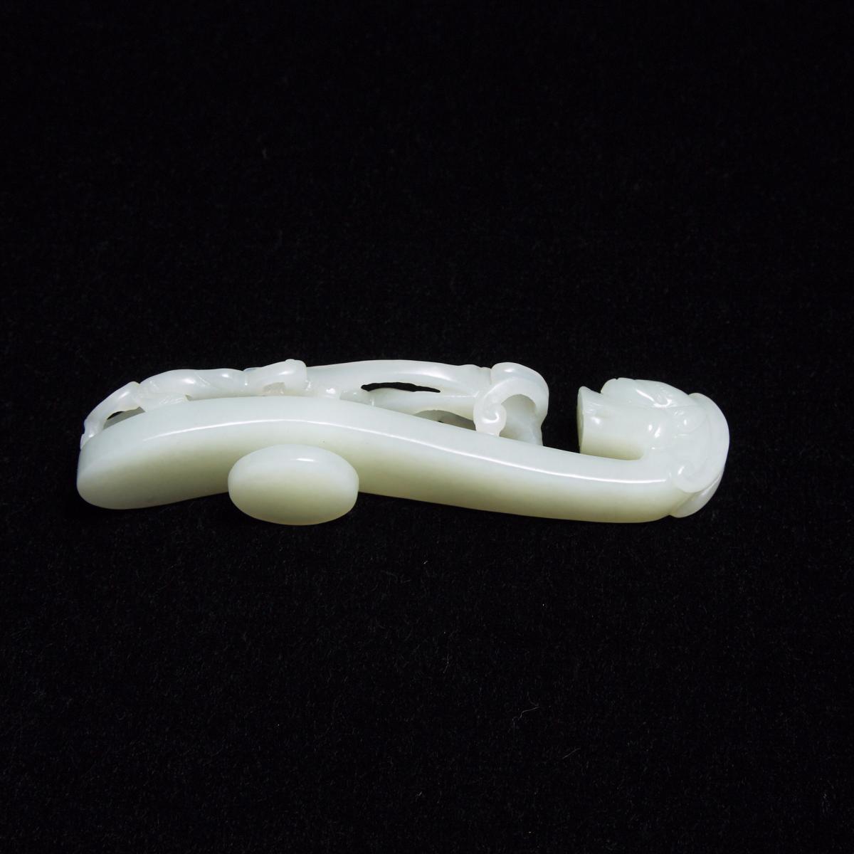 A White Jade Belt Hook, Qing Dynasty, 清 白玉雕'苍龙教子'带钩, length 4 in — 10.2 cm - Image 4 of 4