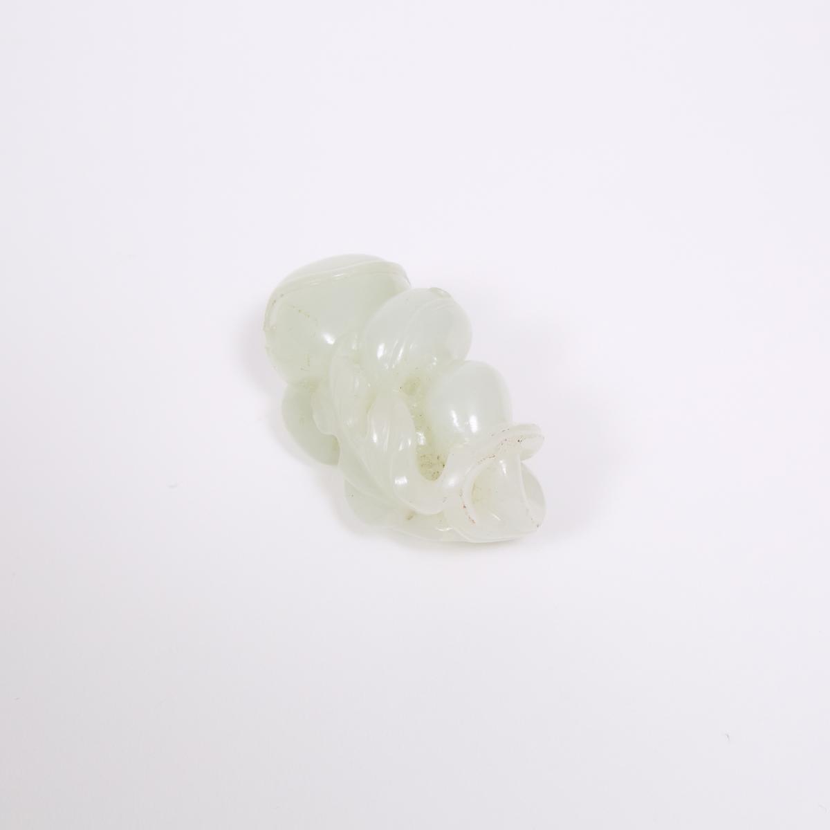 A White Jade Carving of Double Gourds, Qing Dynasty, 清 白玉雕葫芦把件, height 2 in — 5.2 cm - Image 7 of 7