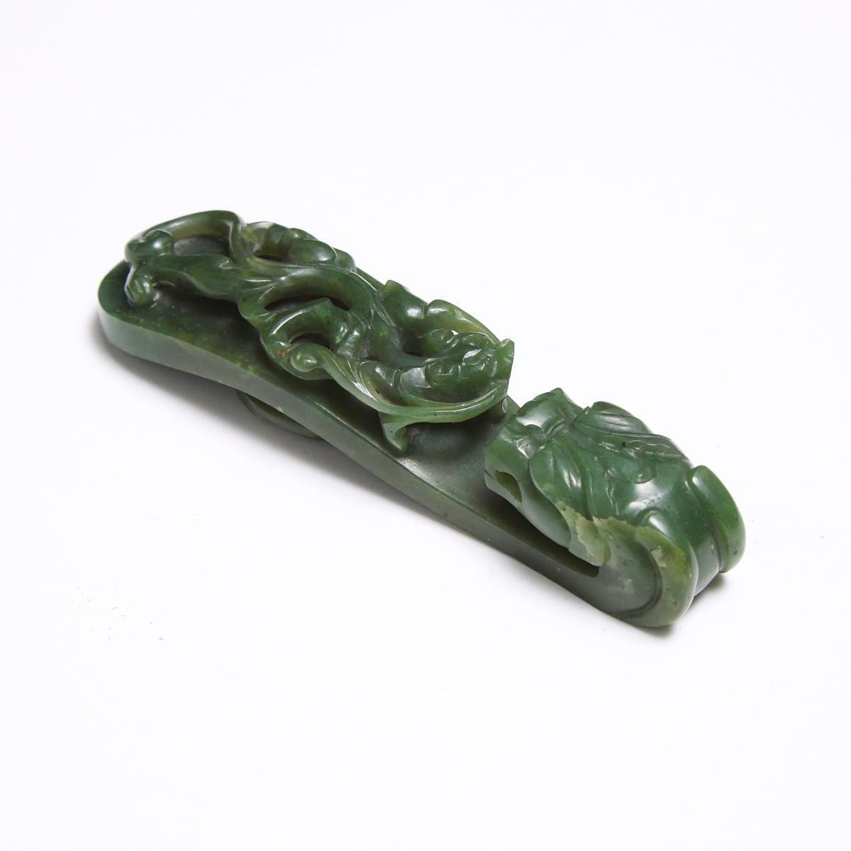 A Spinach Jade 'Dragon' Belt Hook, Qing Dynasty, 清 翠玉雕'苍龙教子'带钩, length 4.3 in — 11 cm - Image 3 of 4